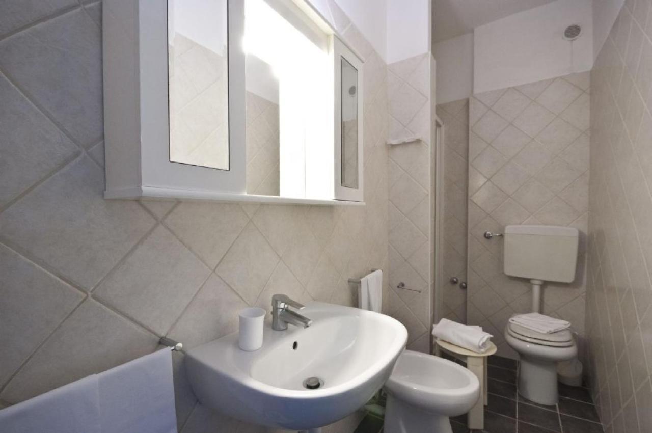 Residence Golfo Della לקונה מראה חיצוני תמונה